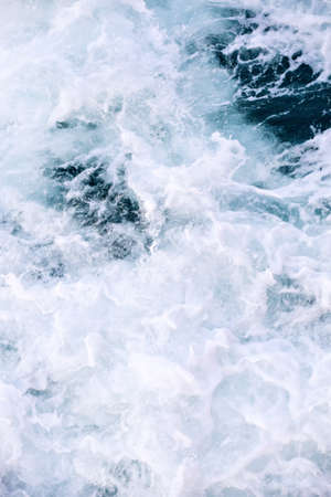 Sea water turbulent foam splashの写真素材