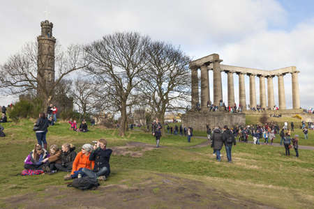 EDINBURGH-SCOTLAND, UK- MARCH 20 : Crowd gathered on Calton hill to witness unique phenomenon of the sun eclipse event on March 20, 2015.のeditorial素材