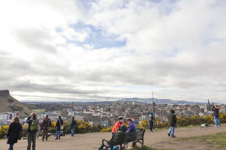 EDINBURGH-SCOTLAND, UK- MARCH 20 : Crowd gathered on Calton hill to witness unique phenomenon of the sun eclipse event on March 20, 2015.のeditorial素材