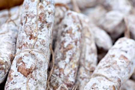 Tasty home-made Italian salami sausage at the farmers market