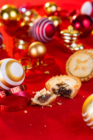 Traditional Christmas mince pies and xmas festive decorationsの写真素材