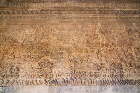 Ancient Khmer bas-relief showing Hindu legend scenes at Angkor Wat temple, Cambodia. Part of series...
