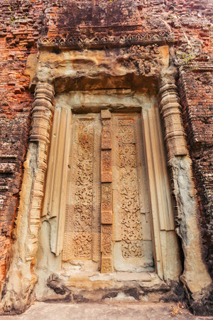 Beautiful carving pattern on the blind door on the top tower of Baksei Chamkrong temple, Angkor Wat complex, Cambodiaの写真素材