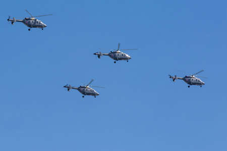 MOSCOW, RUSSIA - MAY 9: Ansat-U light multipurpose helicopters fly on military parade devoted to 70th anniversary of Victory Day in WWII in Europe aka The Great Patriotic War.のeditorial素材