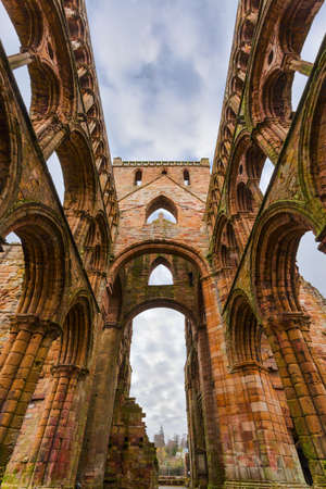 Ruins of Jedburgh Abbey in the Scottish Borders region in Scotland.の写真素材