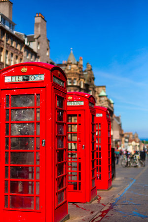 Retro old red telephone booths on Royal mile street in Edinburgh, Capital of Scotland, United Kingdom.の写真素材