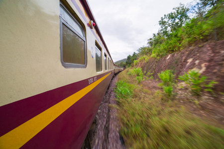 Passenger train cars view from window in Thailand. Railway between Bangkok and Chiang Mai.のeditorial素材