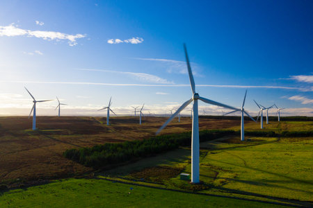 Aerial view of Wind turbines in Scotland. Windmills are the source of alternative renewable...