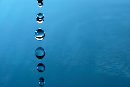 water drops are falling downの写真素材