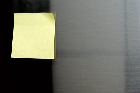 post-it on refrigerator door.