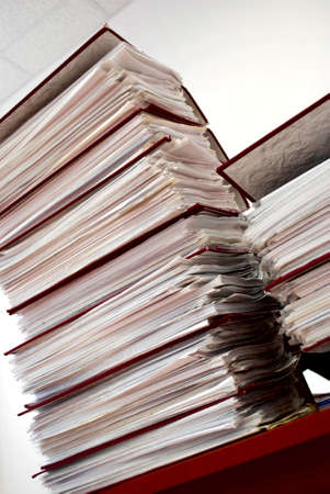 Stack of folders on a tableの写真素材