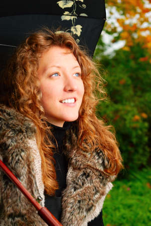 beautiful woman with umbrellaの写真素材