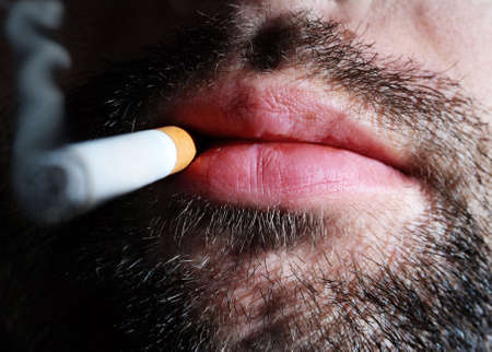 unshaven smokerの写真素材