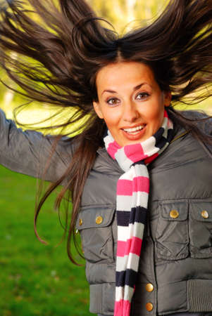 funny portrait of an beautiful autumn womanの写真素材