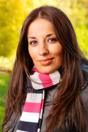 close-up portrait of an beautiful autumn womanの写真素材