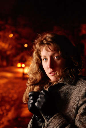 woman on a night streetの写真素材