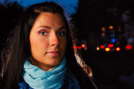 woman on a night streetの写真素材