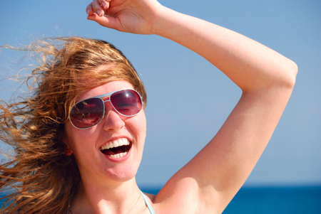 happy beautiful woman on the seaの写真素材