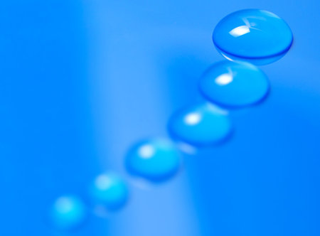 macro shot of blue water dropsの写真素材