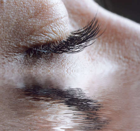  closeup of female closed eyeの写真素材