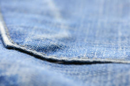 closeup of blue jeans pocket, shallow dofの写真素材