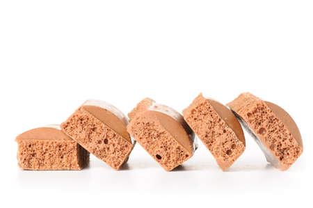 porous chocolate bars isolated on whiteの写真素材