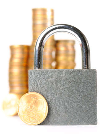 lock and coins, isolated on white の写真素材