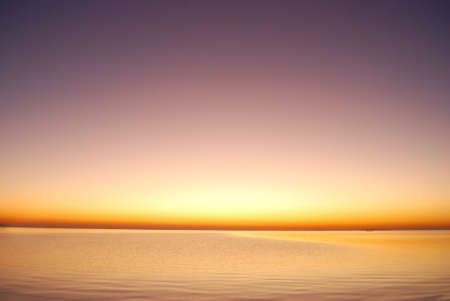 purple sunrise in seaの写真素材