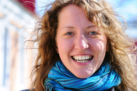 beautiful smiling woman is looking at cameraの写真素材