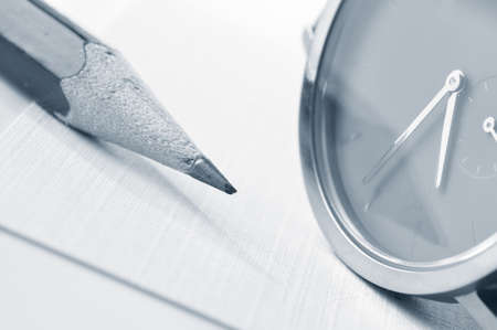 watch and pencil closeupの写真素材