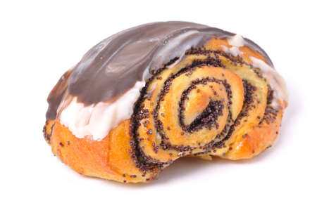 pie with poppyseed iced with chocolate  isolated on whiteの写真素材