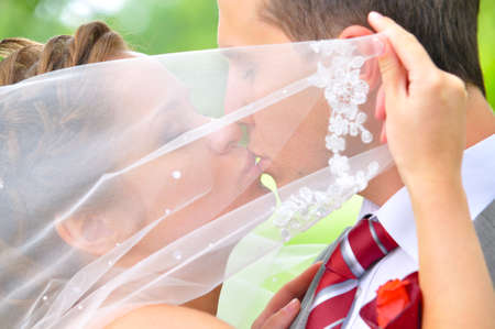 just married couple is kissingの写真素材