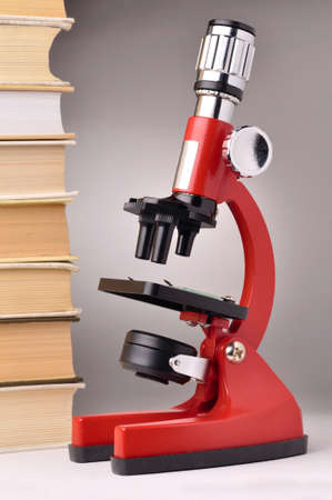 books and microscope, scientific or educational conceptの写真素材
