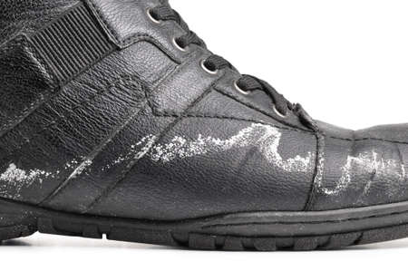 winter boots damaged by reagentsの写真素材