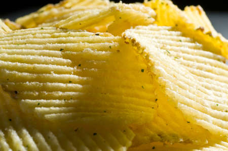 heap of fried chips, macro shotの写真素材