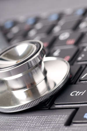 stethoscope on keyboardの写真素材