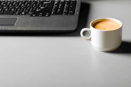 laptop with cup of coffeeの写真素材