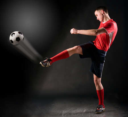 soccer player strikesの写真素材