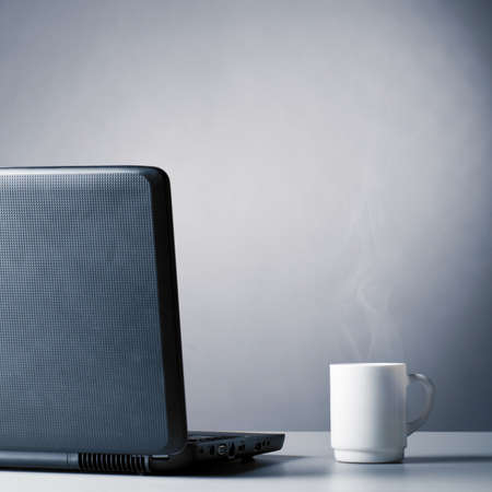 laptop and cupの写真素材