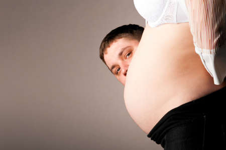 man and pregnant womanの写真素材