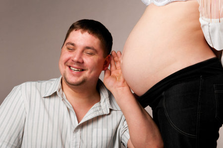 man and pregnant womanの写真素材