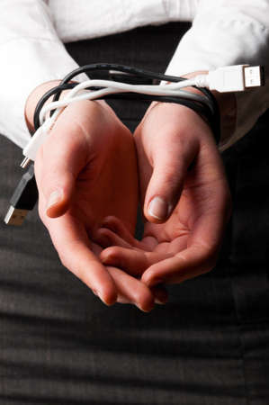 tied up with computer cablesの写真素材