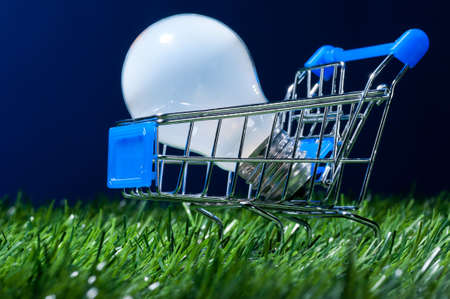 shopping cart in grassの写真素材