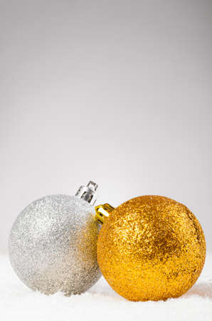 decorative balls on snowの写真素材