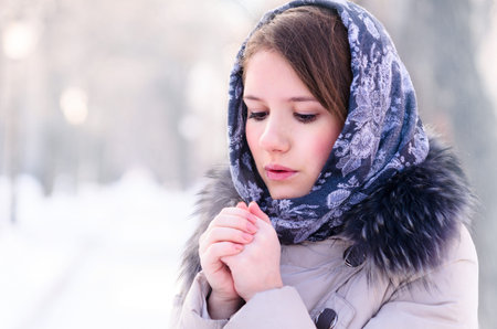 woman is warming up her hands