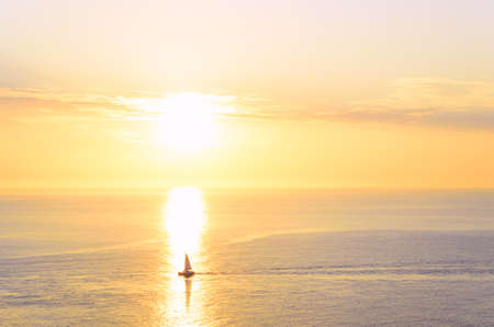 boat silhouette at sunsetの写真素材