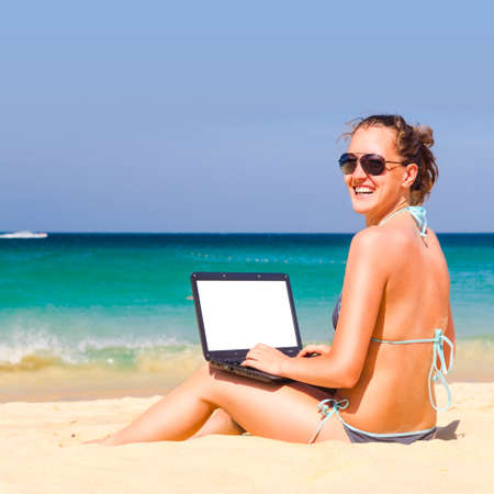 working on the beachの写真素材