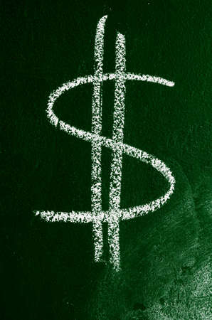 dollar sign on chalk boardの写真素材