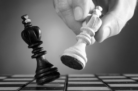 wooden kings on gray background