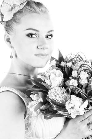 happy bride with flowers portrait, cut out from whiteの写真素材